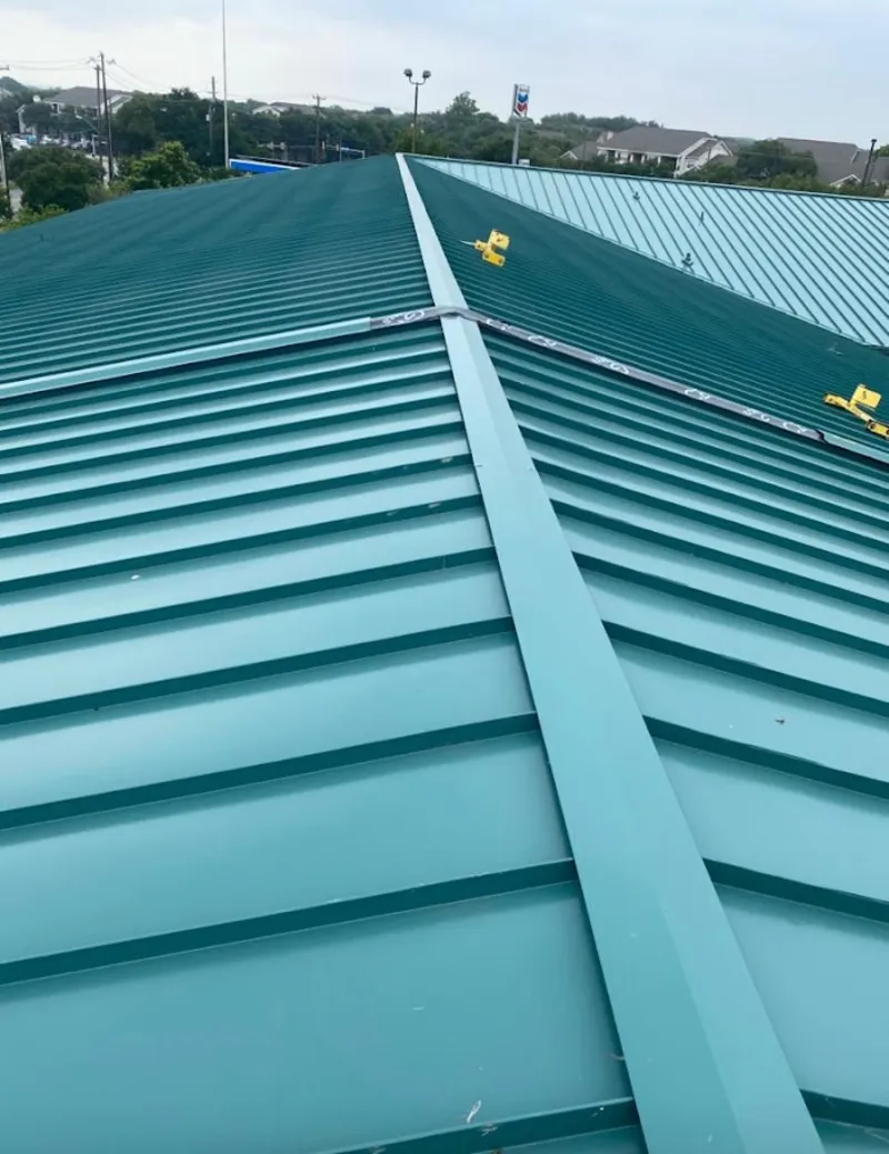 Green commercial metal roof ridge and valley for Metal Roof Repair in Pacific Grove